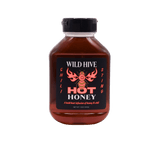Bottle of Wild Hive Chili Sting Hot Honey.