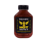 Bottle of Wild Hive Hot Honey Citrus Blaze. 