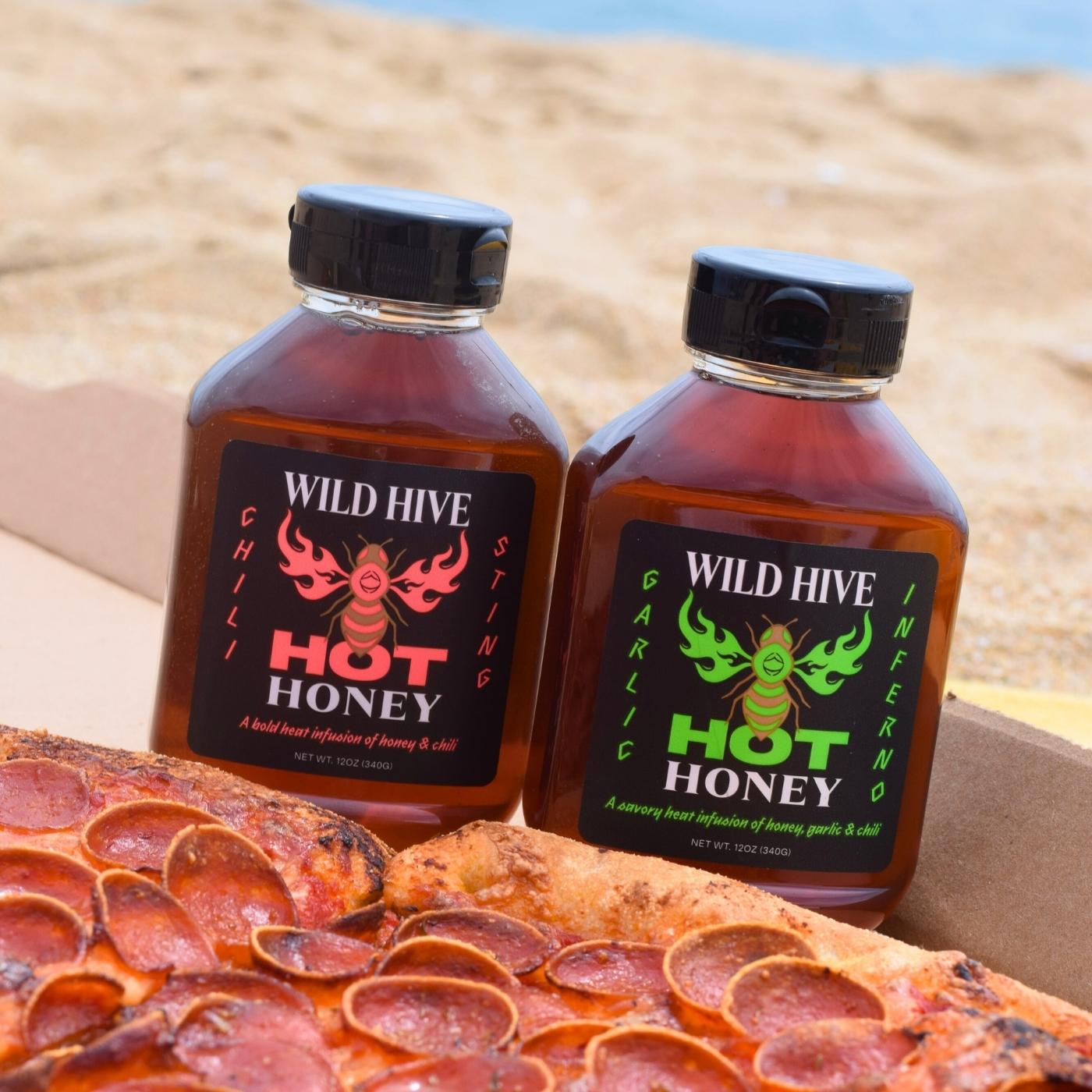 Wild Hive Hot Honey Chili Sting and Garlin Inferno with pizza on the beach. 
